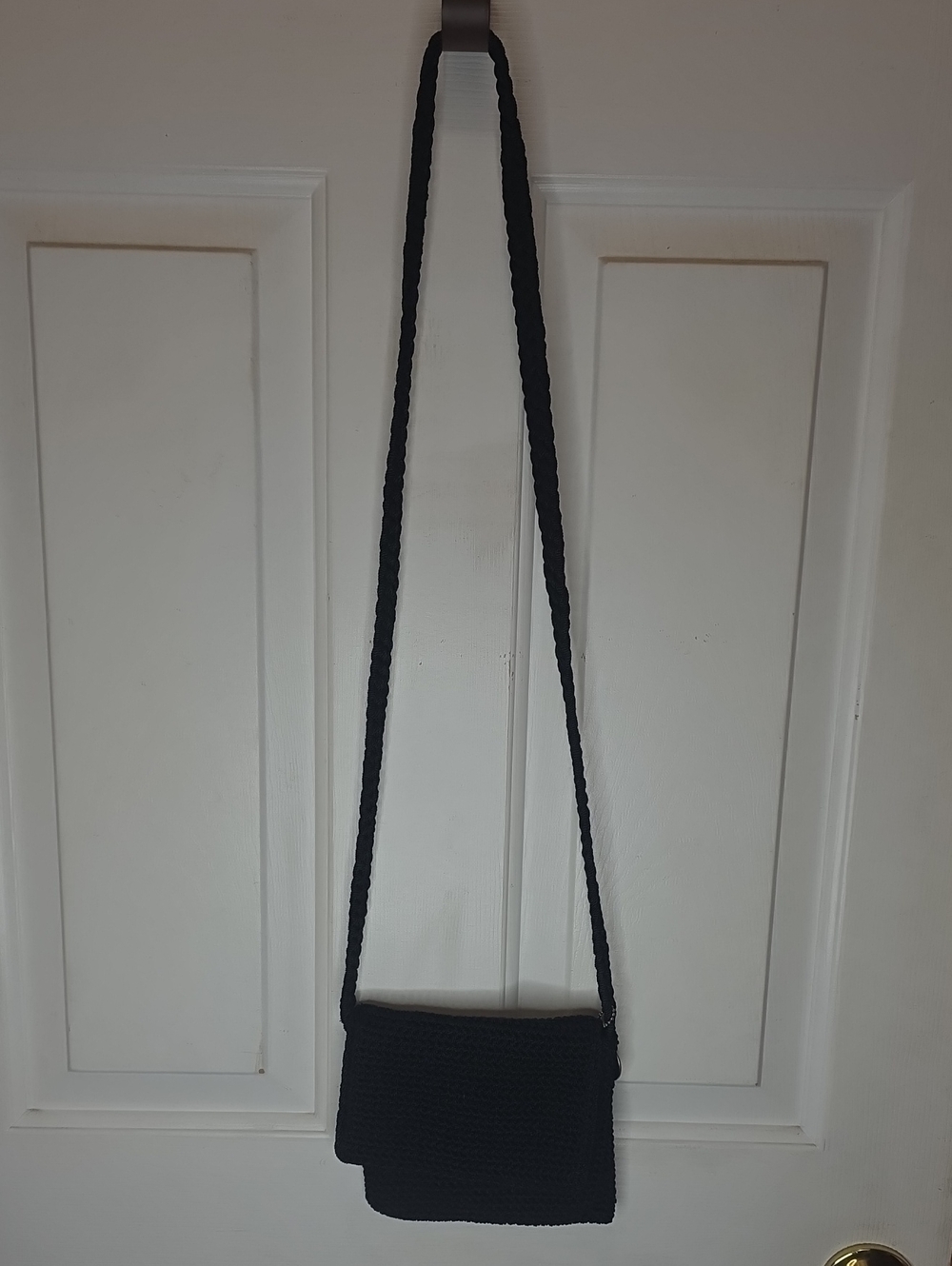 The Sak Black Knit Wristlet with Branded Tag